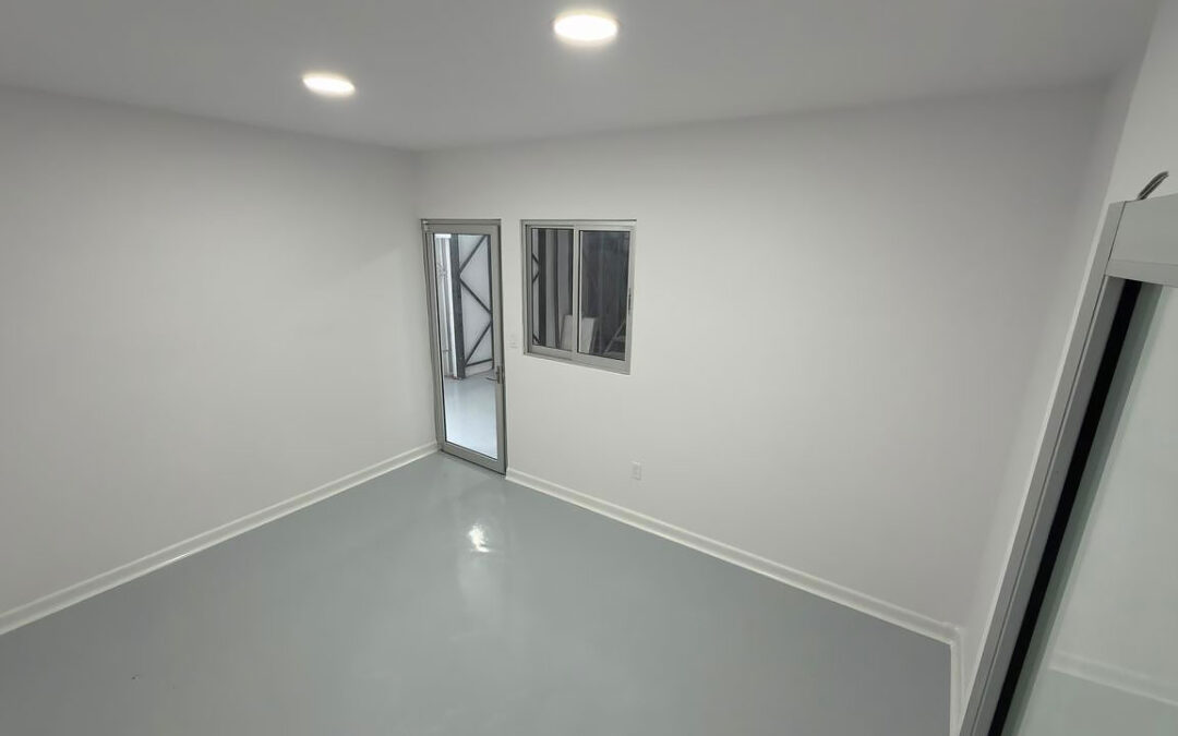 Why “Peel and Stick” Baseboards Fail Food Facility Cove Base Requirements (And What to Use on FRP Walls)