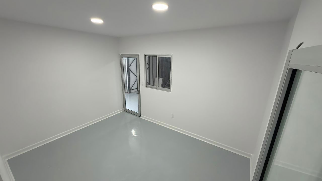 Rigid PVC sanitary cove base installed on FRP wall panels, Cove base requirements food facilities